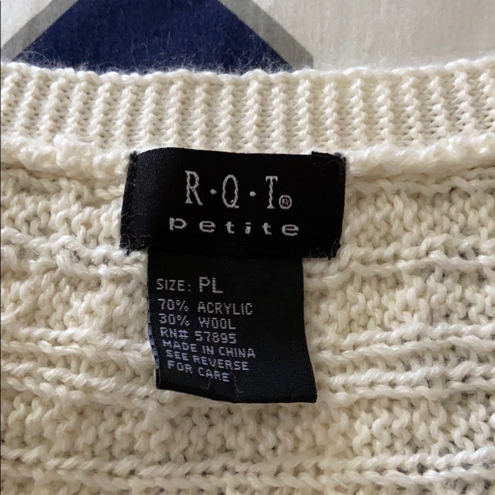 Cream colored short sleeve sweater